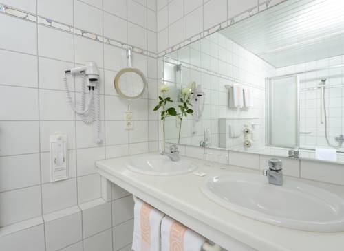 Imagen de la habitación del Hotel Boutique Stadtmitte. Foto 8