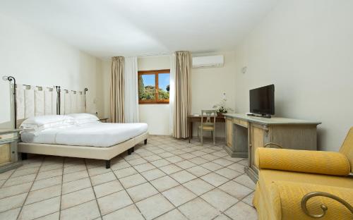 Imagen de la habitación del Hotel Boutique Torre Di Cala Piccola. Foto 6