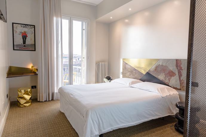 Imagen de la habitación del Hotel Boutique Trieste. Foto 16