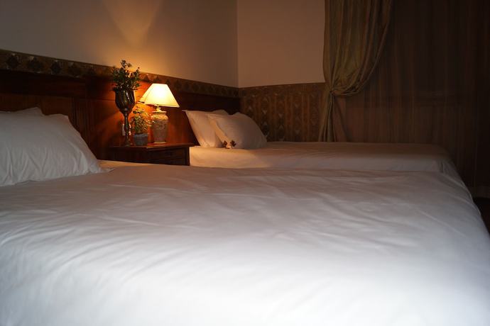Imagen de la habitación del Hotel Boutique Troy. Foto 7