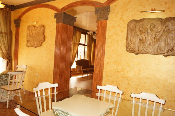Imagen del bar/restaurante del Hotel Boutique Troy. Foto 3