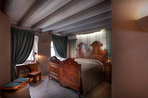 Imagen de la habitación del Hotel Boutique Villa Dei Campi. Foto 9