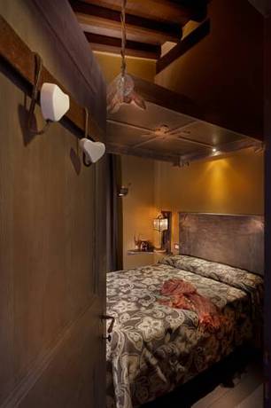 Imagen de la habitación del Hotel Boutique Villa Dei Campi. Foto 15