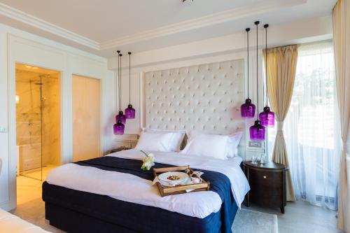 Imagen de la habitación del Hotel Boutique Vissi d\'Arte. Foto 4