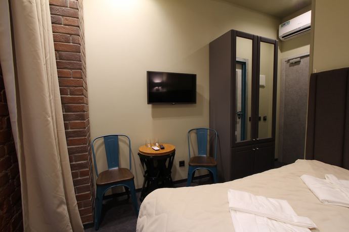 Imagen de la habitación del Hotel Boutique Wellion Baumansky. Foto 4