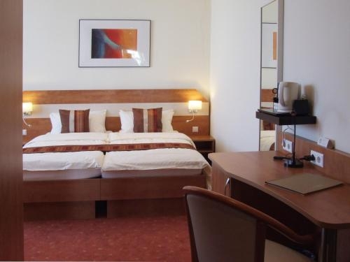 Imagen de la habitación del Hotel Boutique Wolfsburg. Foto 8