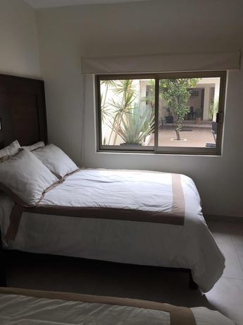 Imagen de la habitación del Hotel Boutique Yaocalli. Foto 8