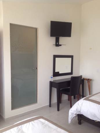 Imagen de la habitación del Hotel Boutique Yaocalli. Foto 9