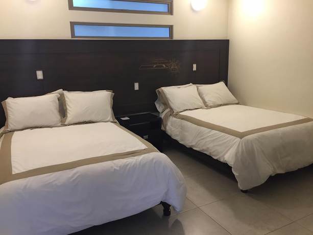Imagen de la habitación del Hotel Boutique Yaocalli. Foto 12