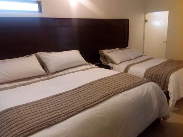 Imagen de la habitación del Hotel Boutique Yaocalli. Foto 19