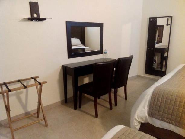 Imagen de la habitación del Hotel Boutique Yaocalli. Foto 20