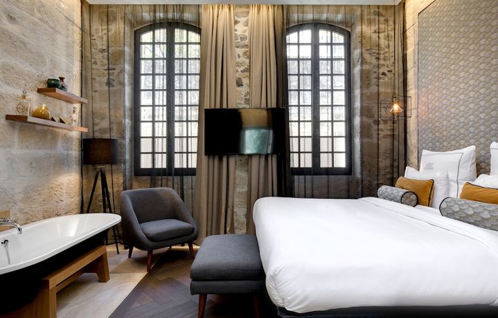 Imagen de la habitación del Hotel Boutique des Remparts. Foto 3