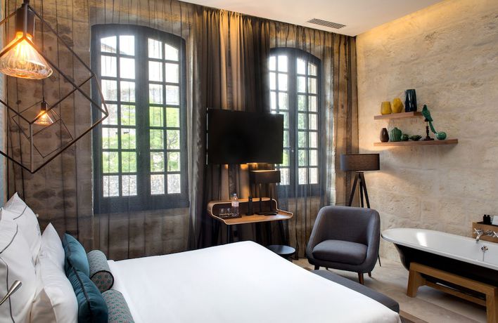 Imagen de la habitación del Hotel Boutique des Remparts. Foto 4