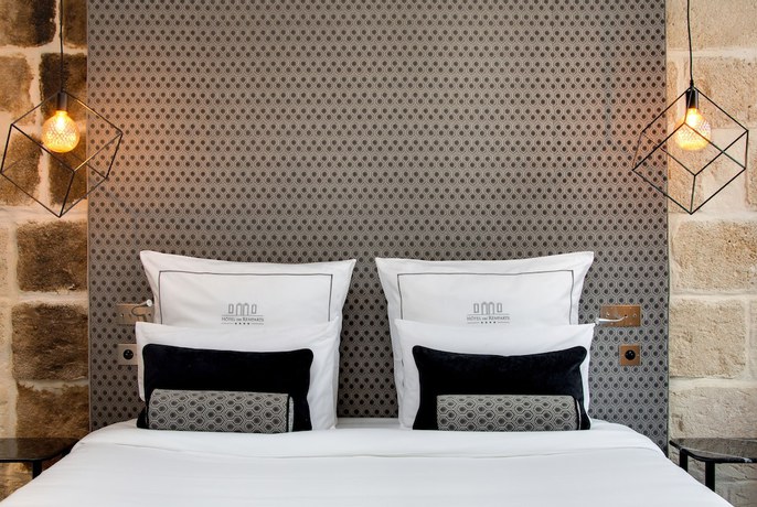 Imagen de la habitación del Hotel Boutique des Remparts. Foto 5