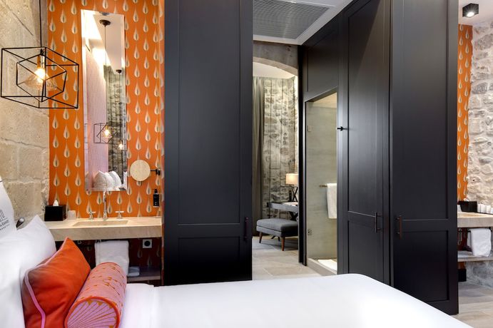 Imagen de la habitación del Hotel Boutique des Remparts. Foto 9