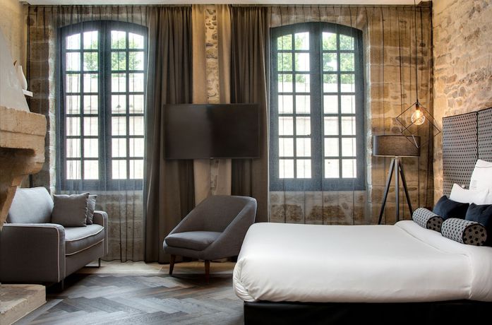 Imagen de la habitación del Hotel Boutique des Remparts. Foto 12