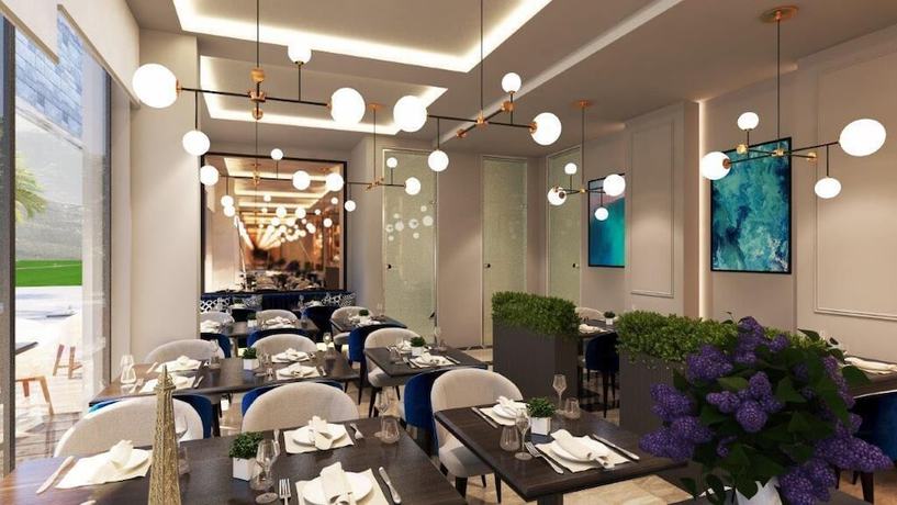 Imagen del bar/restaurante del Hotel Boutique hotel Momentum by Aycon. Foto 2