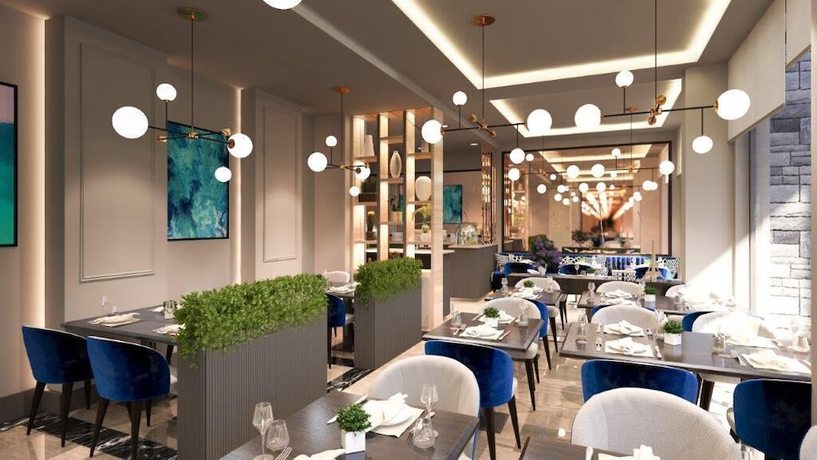 Imagen del bar/restaurante del Hotel Boutique hotel Momentum by Aycon. Foto 3