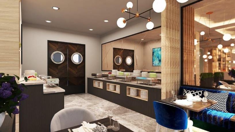 Imagen del bar/restaurante del Hotel Boutique hotel Momentum by Aycon. Foto 5