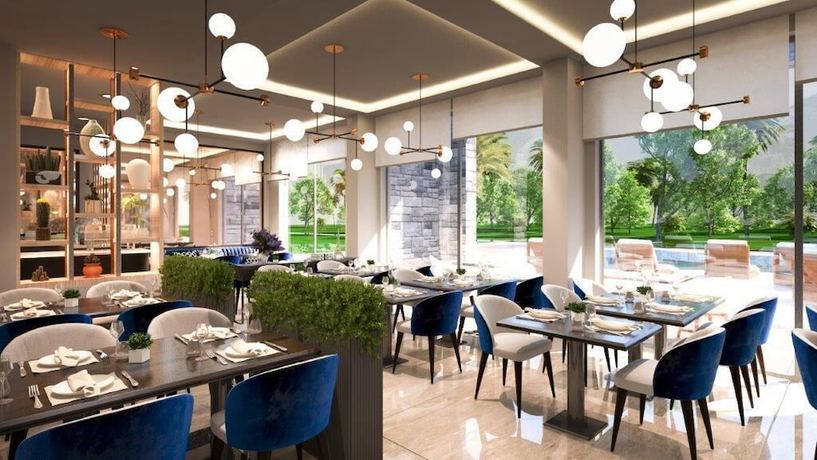 Imagen del bar/restaurante del Hotel Boutique hotel Momentum by Aycon. Foto 6