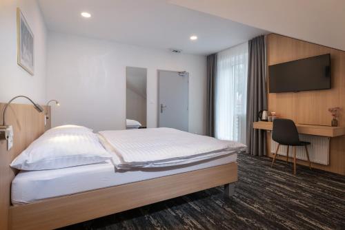 Imagen de la habitación del Hotel Boutique hotel Vila Efekt. Foto 18