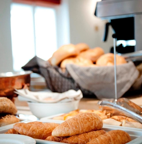 Imagen del bar/restaurante del Hotel Boutiquehotel Amadeus. Foto 2