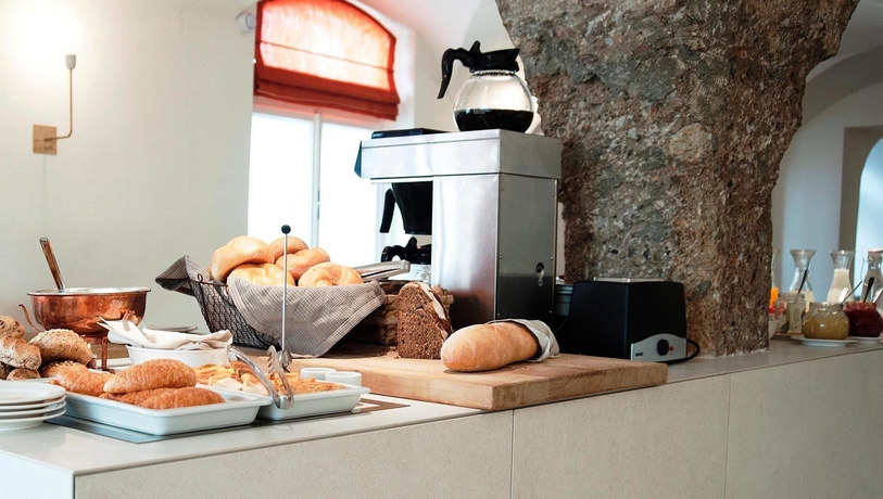 Imagen del bar/restaurante del Hotel Boutiquehotel Amadeus. Foto 9