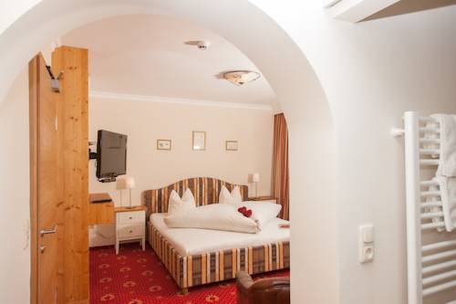 Imagen de la habitación del Hotel Boutiquehotel Berghof. Foto 4
