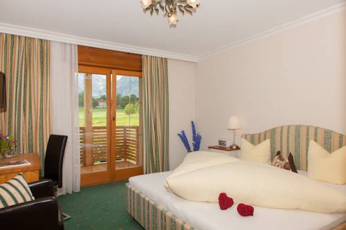Imagen de la habitación del Hotel Boutiquehotel Berghof. Foto 7