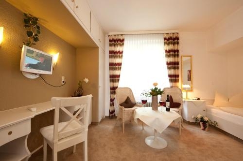 Imagen de la habitación del Hotel Boutiquehotel Das Haus Am Walde. Foto 10