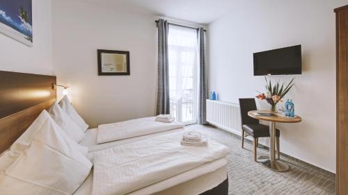 Imagen de la habitación del Hotel Boutique-hotel Kronenstuben. Foto 5