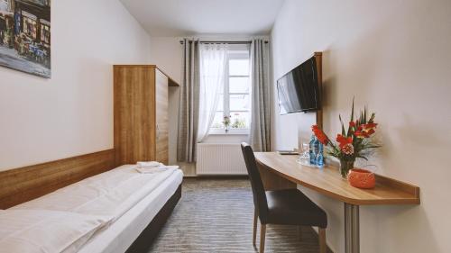 Imagen de la habitación del Hotel Boutique-hotel Kronenstuben. Foto 7