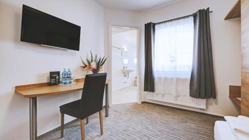 Imagen de la habitación del Hotel Boutique-hotel Kronenstuben. Foto 9
