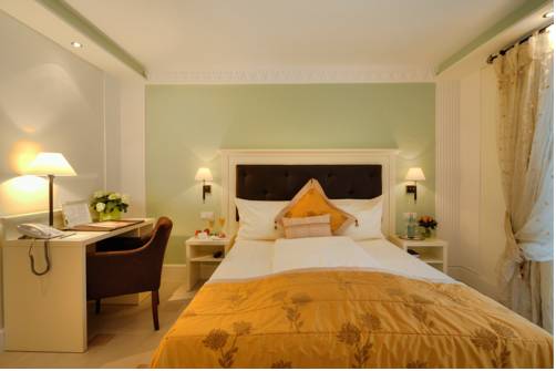 Imagen de la habitación del Hotel Boutiquehotel La Casa. Foto 4