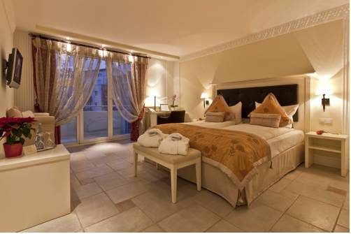 Imagen de la habitación del Hotel Boutiquehotel La Casa. Foto 7