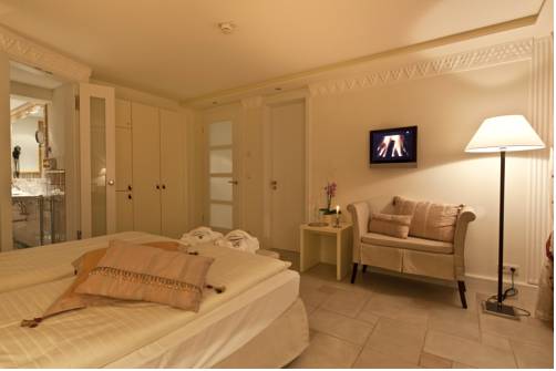 Imagen de la habitación del Hotel Boutiquehotel La Casa. Foto 8