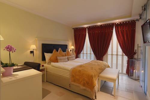 Imagen de la habitación del Hotel Boutiquehotel La Casa. Foto 10