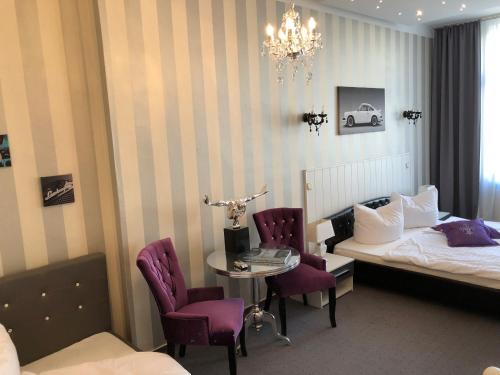 Imagen de la habitación del Hotel Boutiquehotel Mason. Foto 8