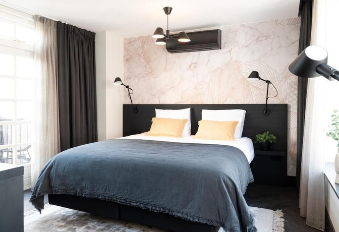 Imagen de la habitación del Hotel Boutiquehotel Princenjagt. Foto 13