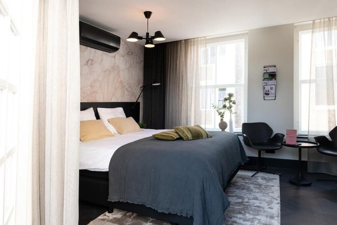 Imagen de la habitación del Hotel Boutiquehotel Princenjagt. Foto 14
