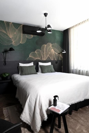Imagen de la habitación del Hotel Boutiquehotel Princenjagt. Foto 15