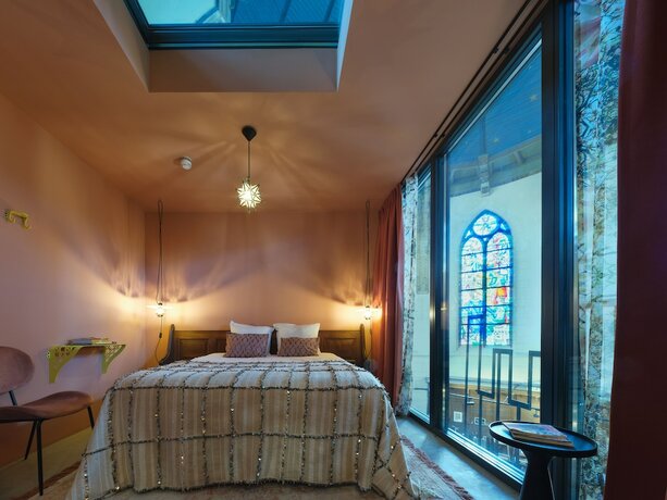 Imagen de la habitación del Hotel Boutiquehotel The Church. Foto 18