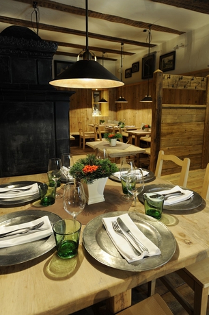 Imagen del bar/restaurante del Hotel Boutiquehotel Weisses R&ouml;ssl. Foto 3