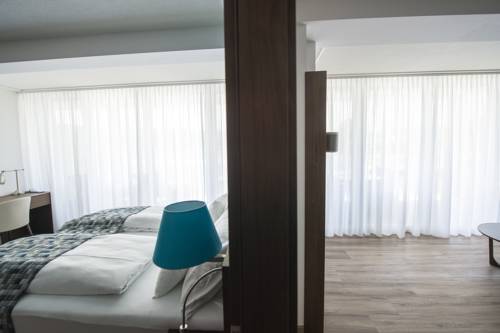 Imagen de la habitación del Hotel Boutiquehotel W&ouml;rthersee. Foto 5