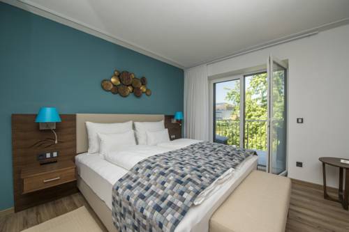 Imagen de la habitación del Hotel Boutiquehotel W&ouml;rthersee. Foto 7