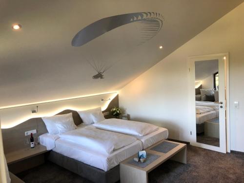 Imagen de la habitación del Hotel Boutique-im Weingarten. Foto 6