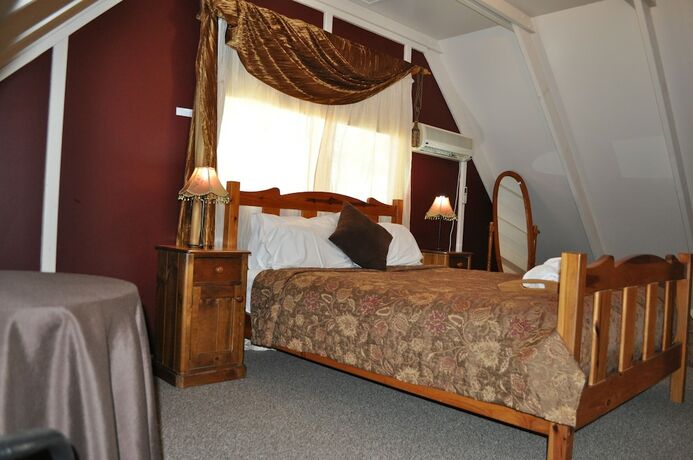 Imagen de la habitación del Hotel Bracken Ridge Villas. Foto 17