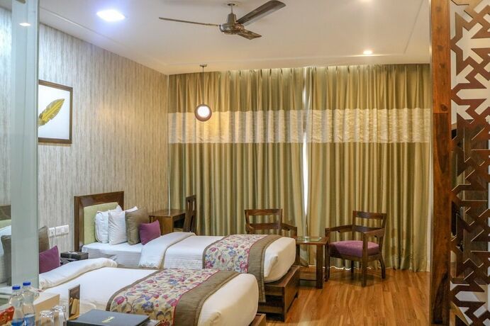 Imagen de la habitación del Hotel Brahma Horizon. Foto 15