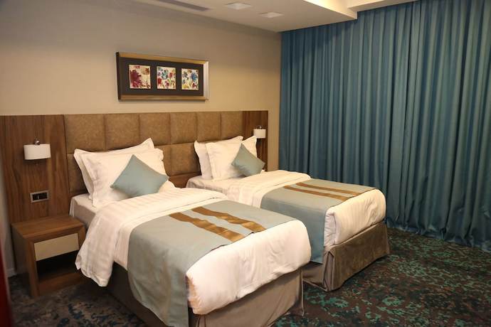 Imagen de la habitación del Hotel Bram Suites. Foto 9