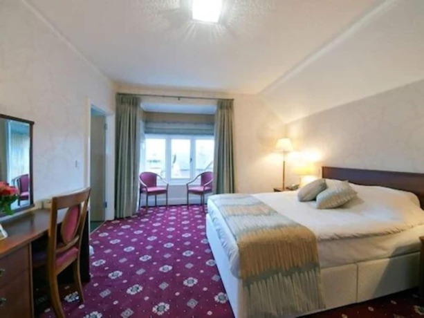 Imagen de la habitación del Hotel Brambletye. Foto 10